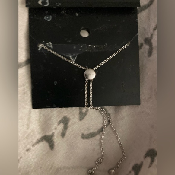 It’s a bracelet and it’s silver and it’s from coach and it’s new never been used - Picture 4 of 4